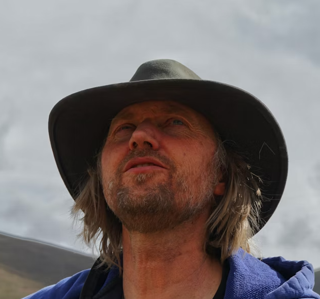 Man wearing black hat